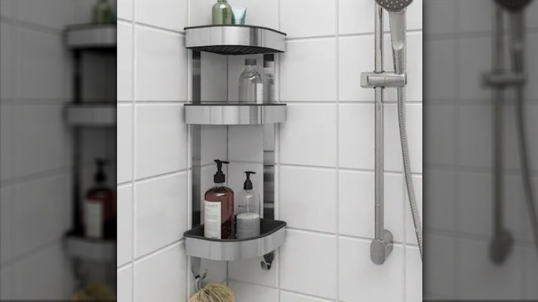 Metal shower shelf in corner