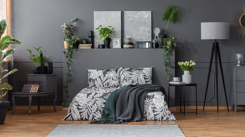 bedroom with plant patterned sheets