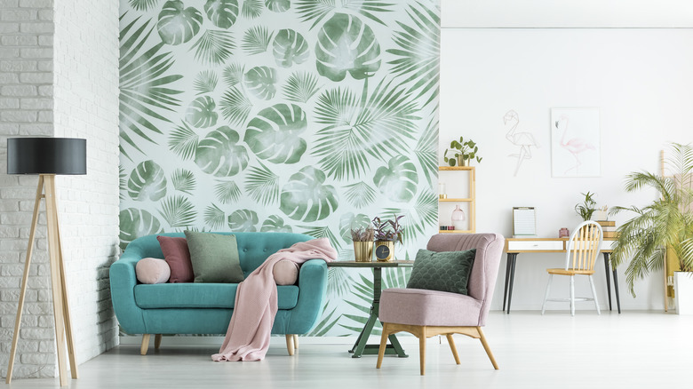 living room with plant wallpaper