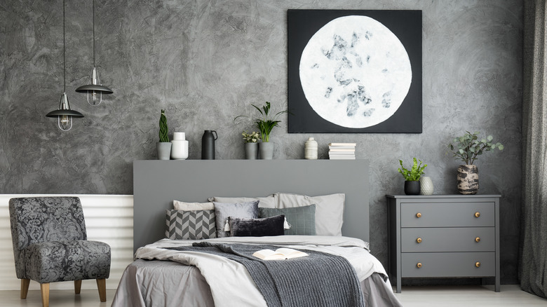 bedroom with moon wall art