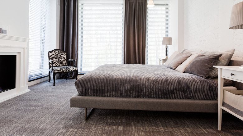 zebra print chair in a bedroom