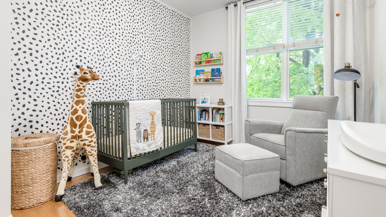 animal print wallpaper in a nursery