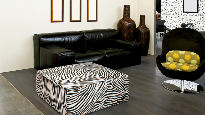 zebra print footstool in a living room