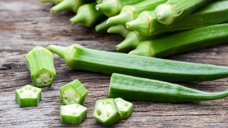 Sliced okra on wood table