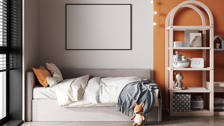 Orange accent wall kid's room