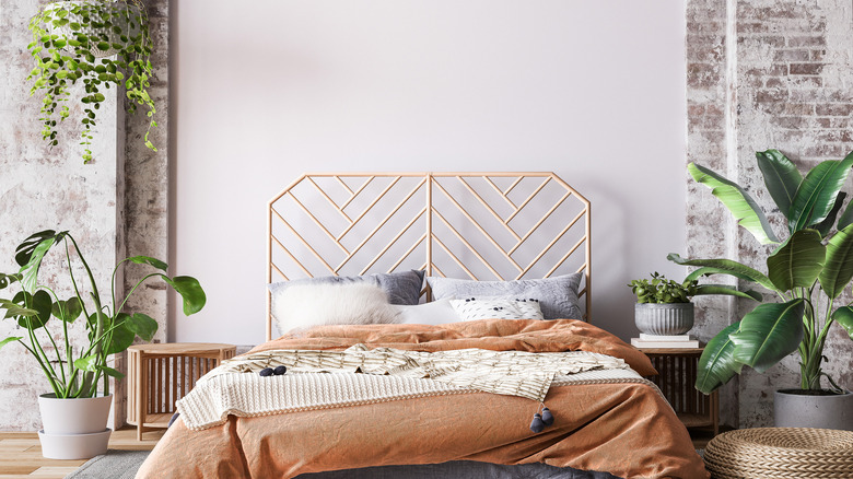 Loft style bedroom orange bedspread