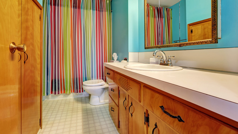 striped shower curtain in bathroom