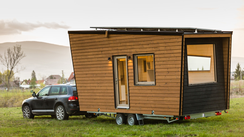 mobile tiny house and car
