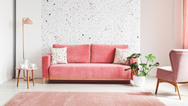 pink rug and pink couch