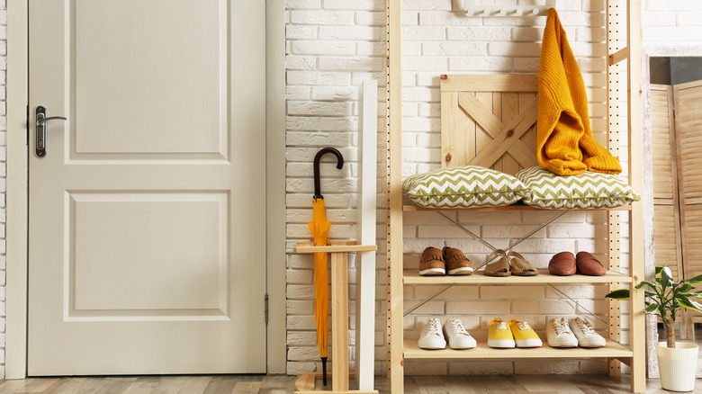 shoes on rack in entryway