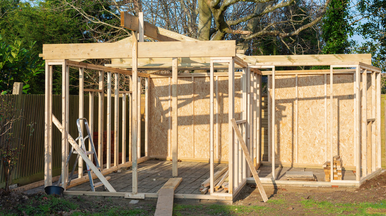 unfinished structure with stone base