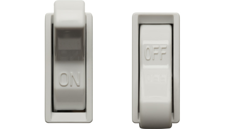 Two toggle switches in opposite positions
