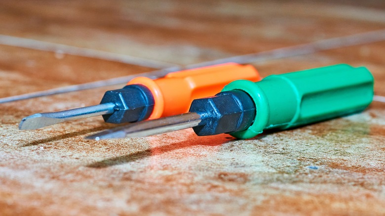 Orange and green bolster screwdrivers