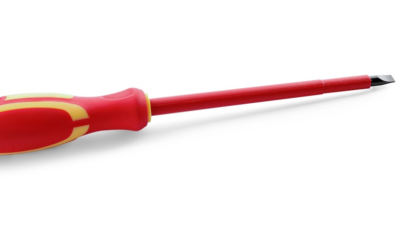 Red electrician's insulated screwdriver
