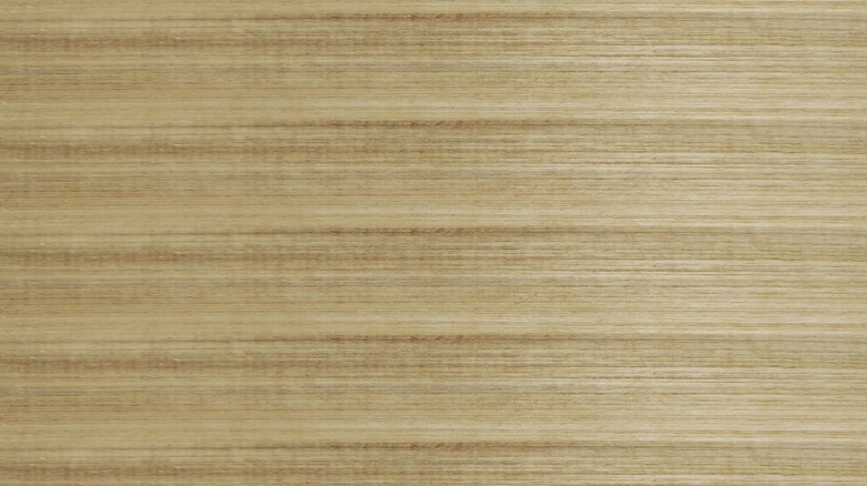 teak wood board in focus