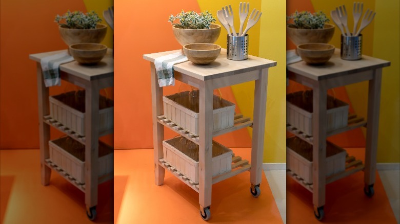 wooden bar cart with containers