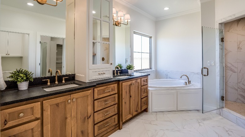 Craftsman bathroom with wood cabinets