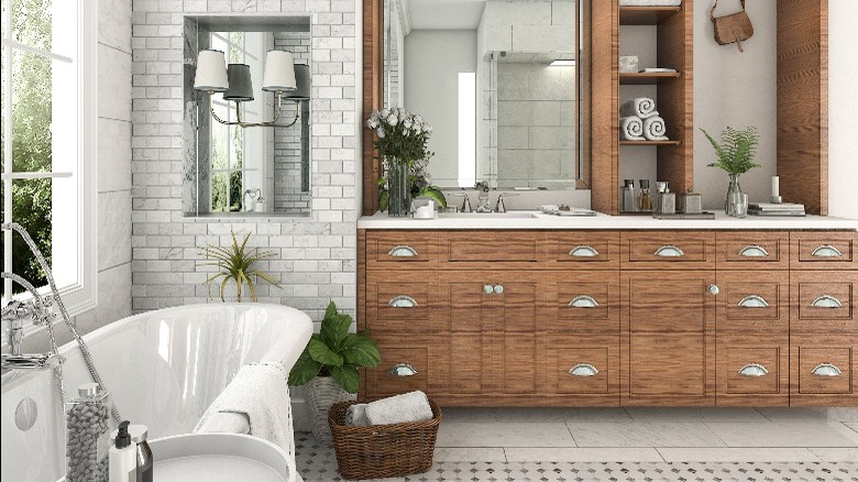 Modern bathroom with wood cabinets