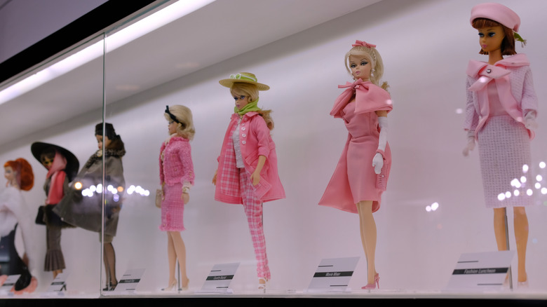 vintage barbies in display case