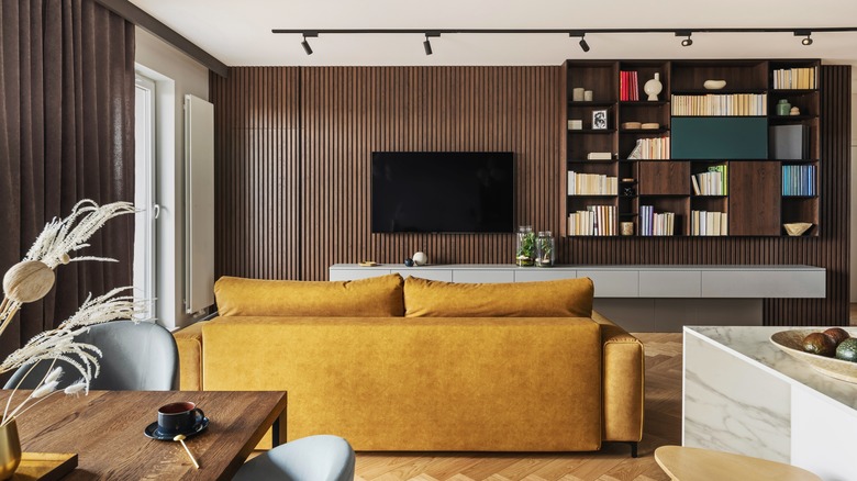 wooden lamella wall behind television