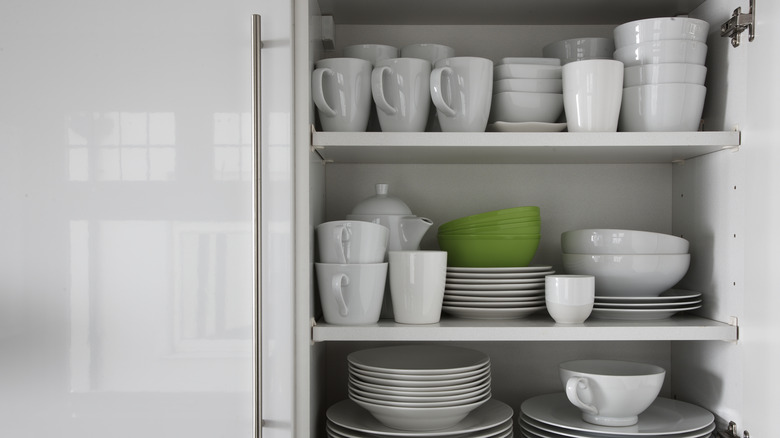 Dishes in a cabinet