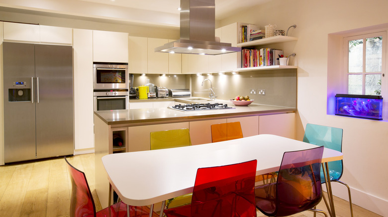 dining room with colorful chairs