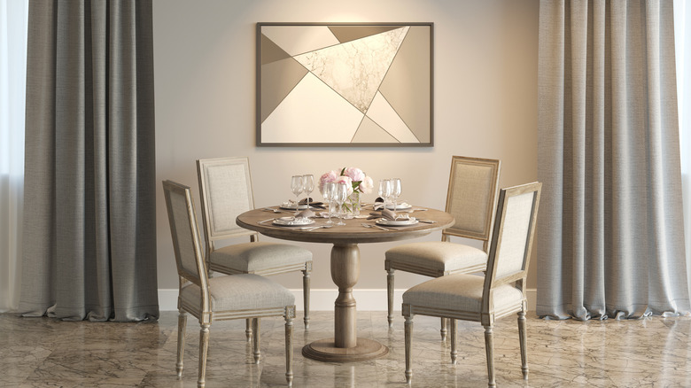 dining room with marble art