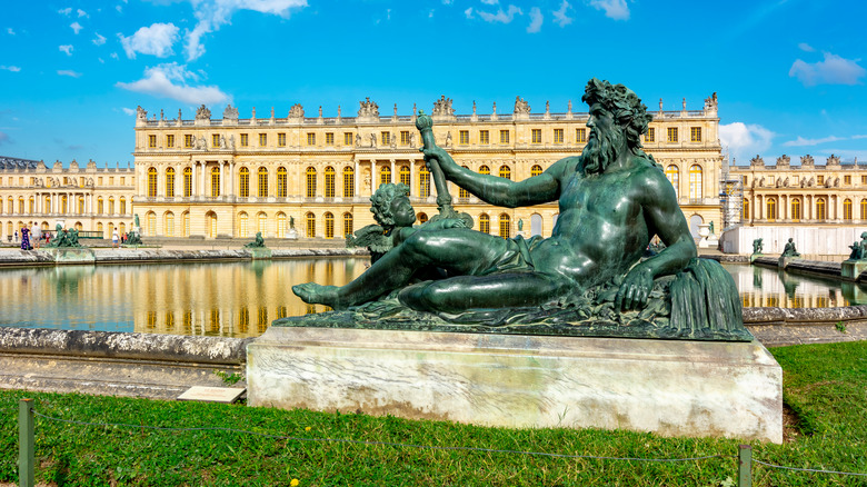 Green oxidized Neptune statue