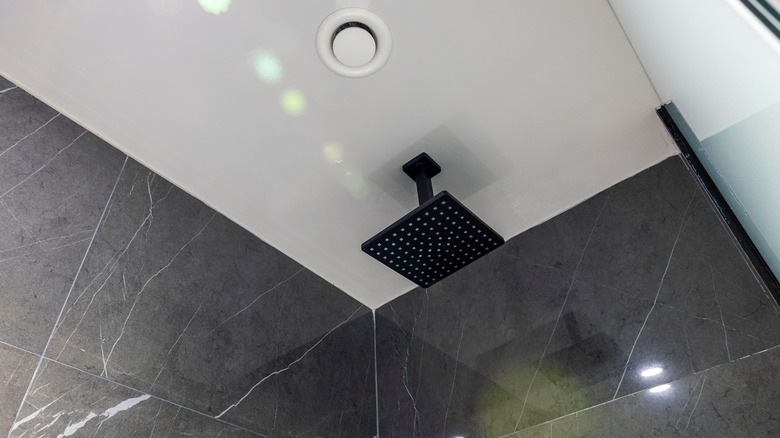 black shower head on ceiling