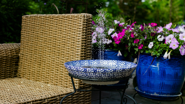 Blue and white bird bath