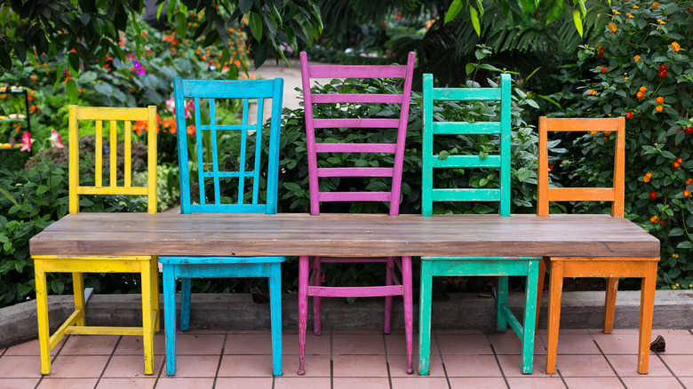 bench made from mismatched chairs