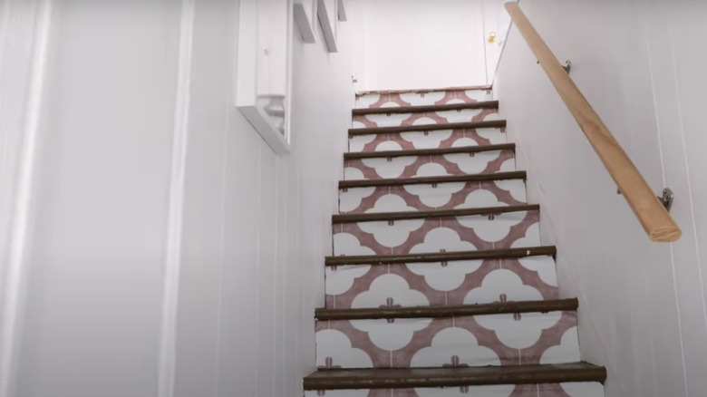 patterned wallpaper on staircase risers