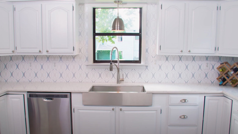 patterned wallpaper on kitchen backsplash