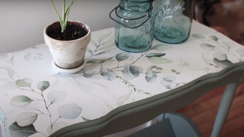 leaf print wallpaper on table