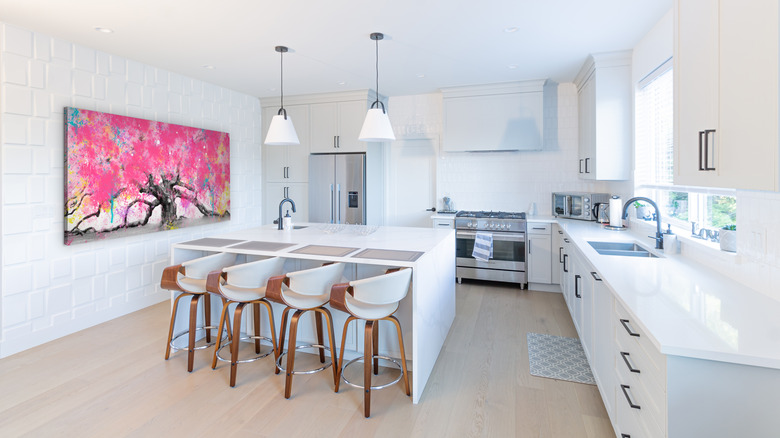 large pink painting in kitchen