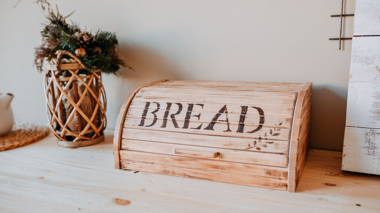 wood breadbox on kitchen counter