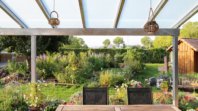 wooden pergola with plastic covering