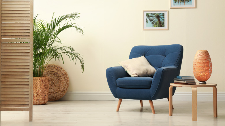 blue chair with beige cushion