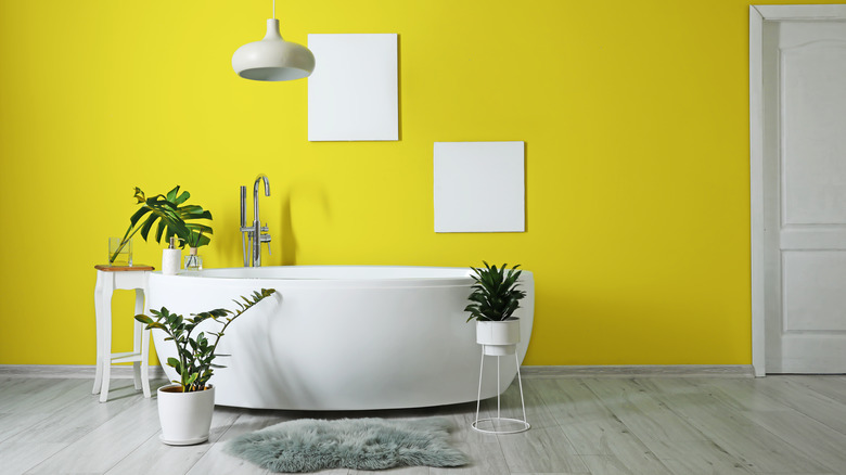a bright lemon yellow bathroom