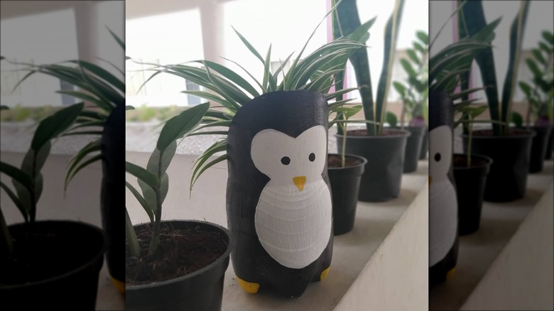 painted penguin plastic planter