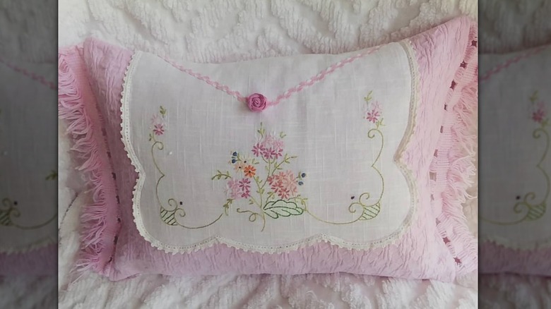 pink and white decorative pillow