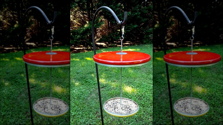 red upcycled lid bird feeder