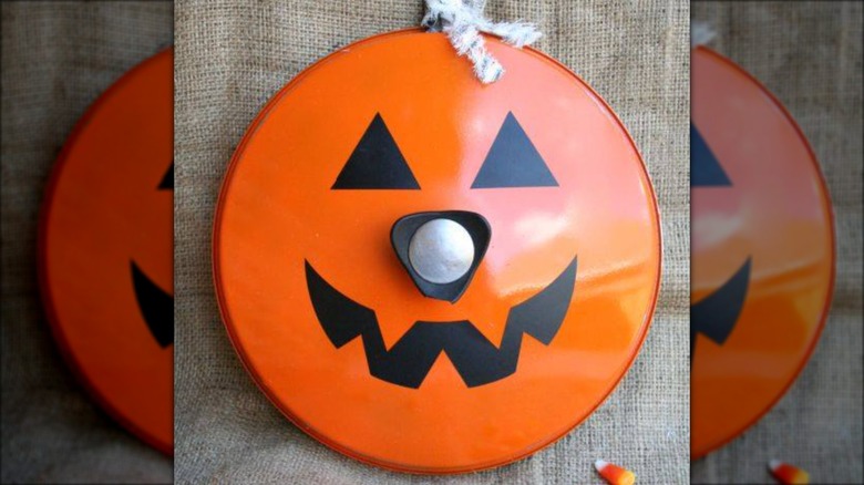 jack-o-lantern pot lid decoration