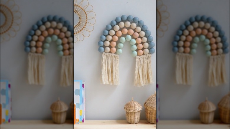 Rainbow wall hanging made from ping pong balls