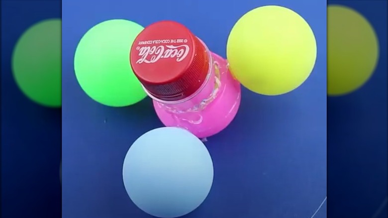 Spinner made from ping pong balls and plastic soda bottle