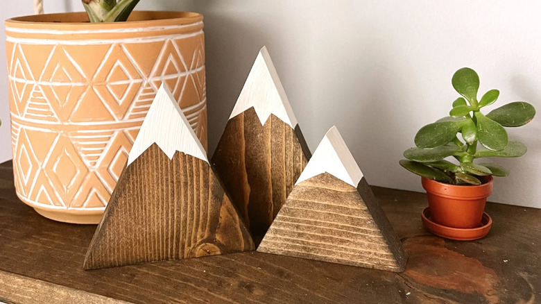 small wooden mountain decorations