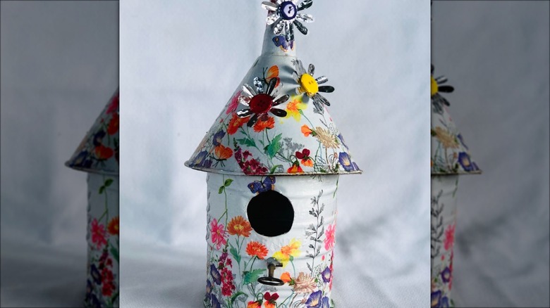 floral painted metal birdhouse