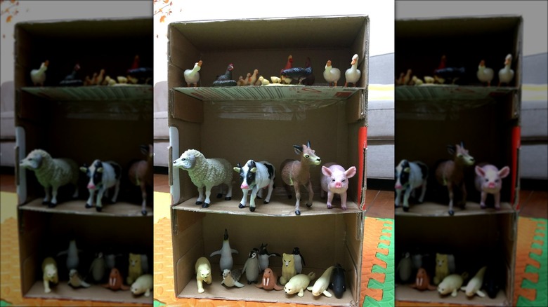 cardboard box shelves with toys