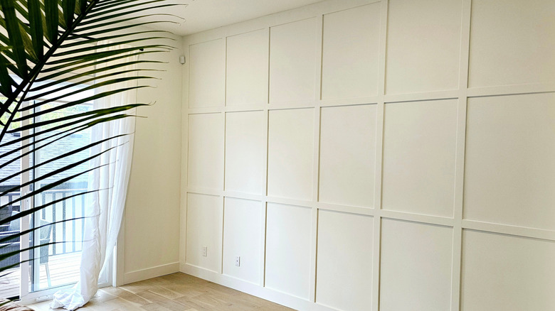 White board and batten panels as an accent wall in a home