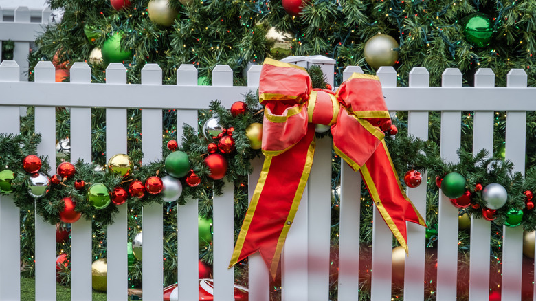 Christmas garland made of ornaments attached to evergreens